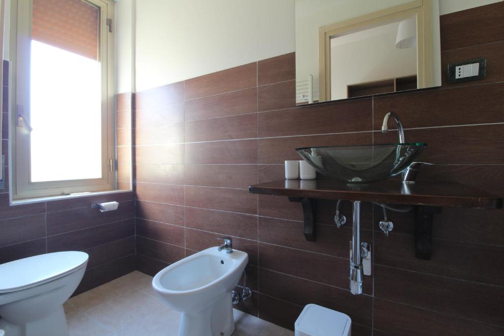 Koupelna v ubytování Acquacorrente Rooms - a due passi dal mare