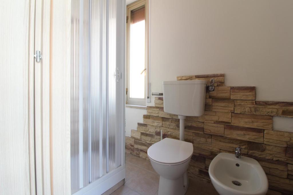 Koupelna v ubytování Acquacorrente Rooms - a due passi dal mare
