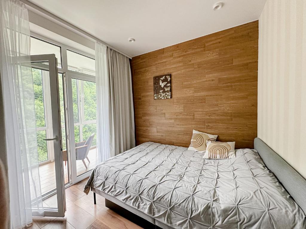 Postel nebo postele na pokoji v ubytování "АпартСервic" жк Сонячний квартал