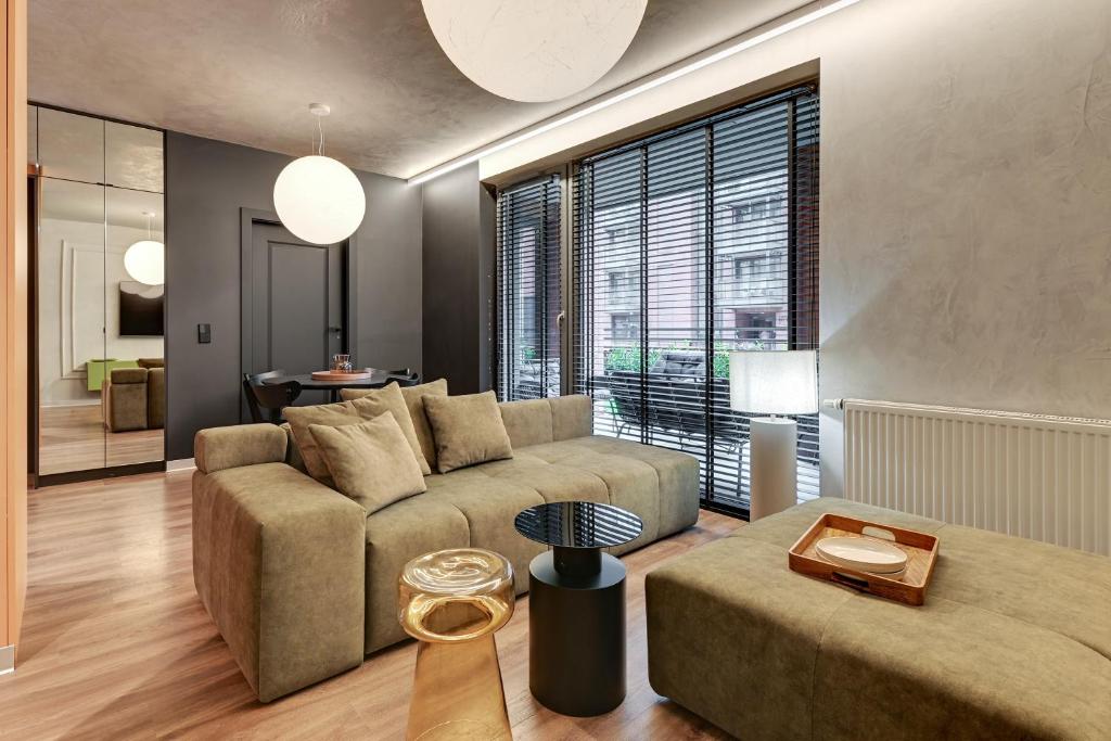 Posezení v ubytování SCALA Apartments City Center & Parking by Downtown Apartments