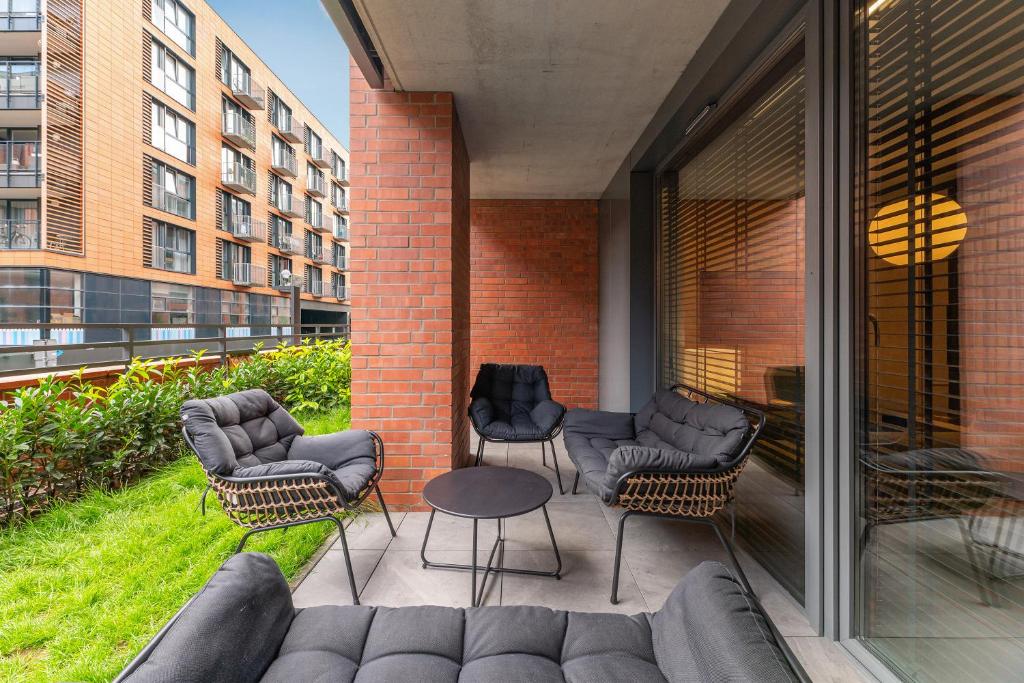 Posezení v ubytování SCALA Apartments City Center & Parking by Downtown Apartments