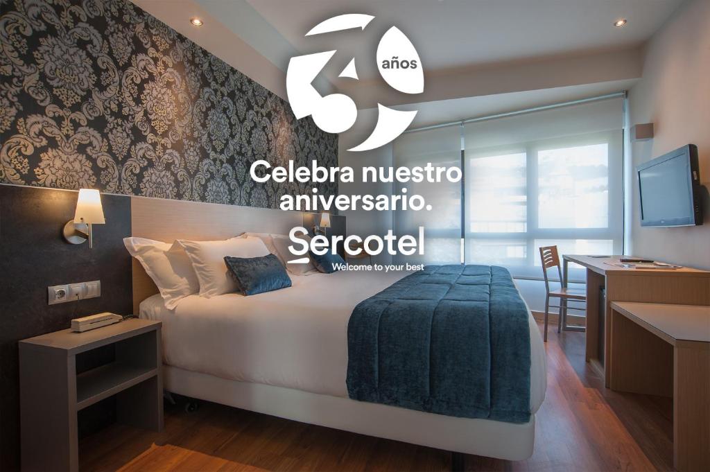 Ένα ή περισσότερα κρεβάτια σε δωμάτιο στο Sercotel Codina