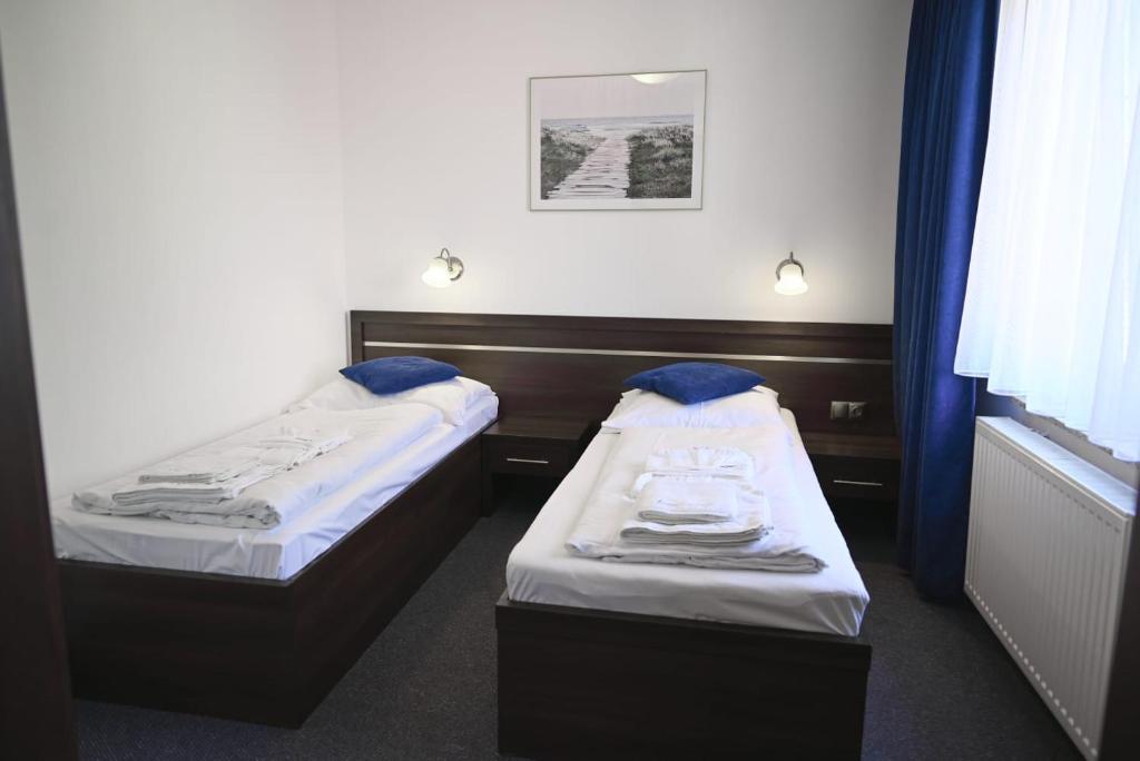 Posteľ alebo postele v izbe v ubytovaní Lazur Wellness@Spa