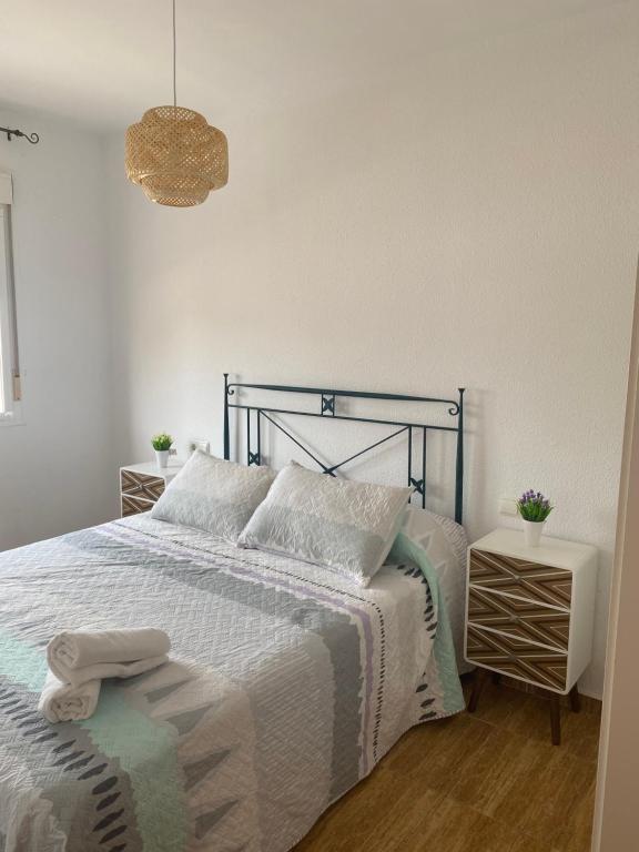 Posteľ alebo postele v izbe v ubytovaní Acogedor apartamento en el paraiso