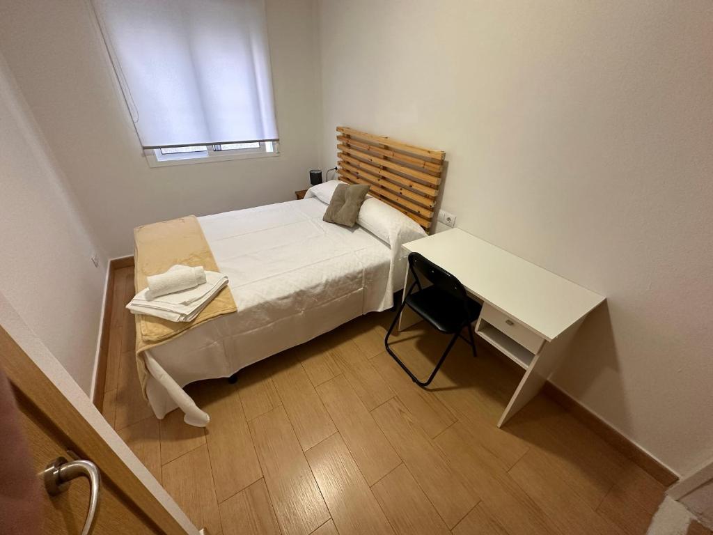 Posteľ alebo postele v izbe v ubytovaní Piso Reformado Pontevedra