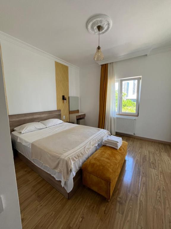 Llit o llits en una habitació de HOTEL Dadu