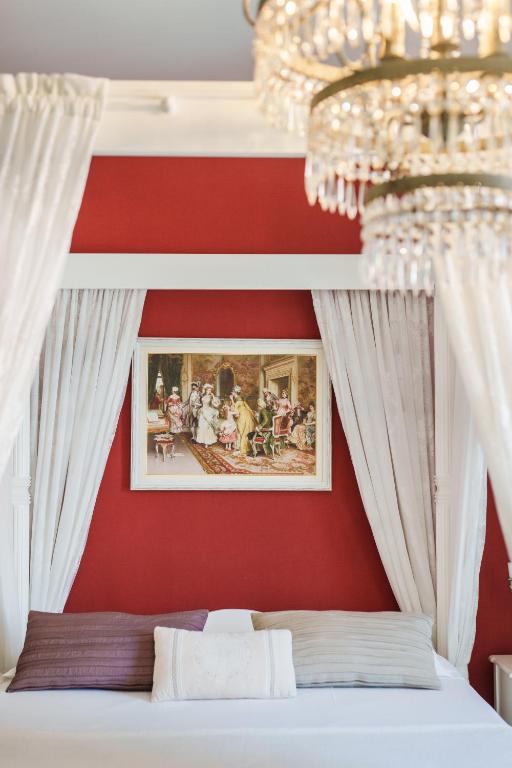 A bed or beds in a room at It's Room Naples