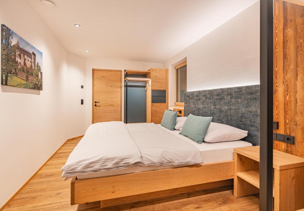 Postel nebo postele na pokoji v ubytování Linhea Apartments