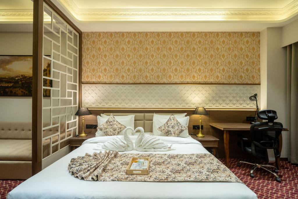 Postel nebo postele na pokoji v ubytování Hotel Mivaante