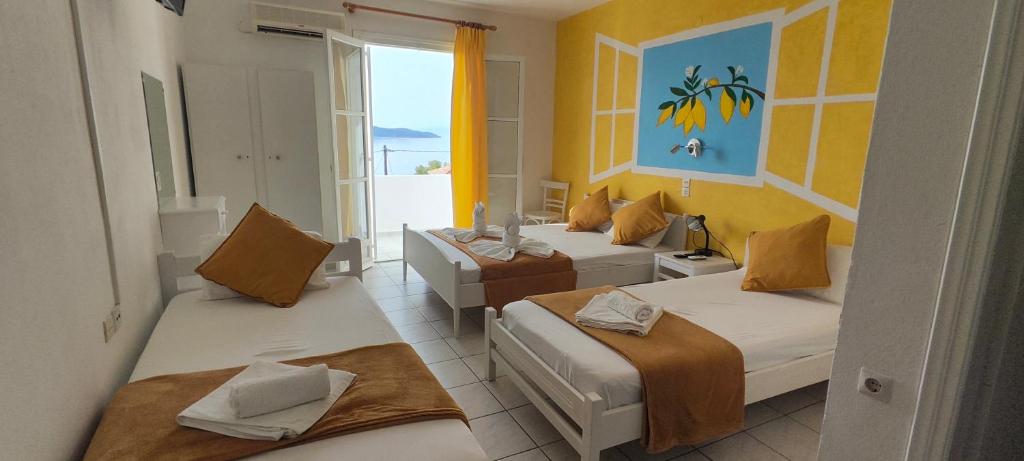Postel nebo postele na pokoji v ubytování Amaranthos Skiathos View