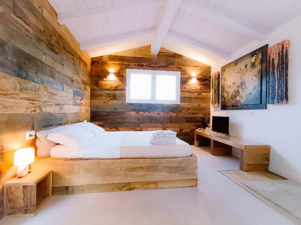 Postel nebo postele na pokoji v ubytování B&B Non ti scordar di me
