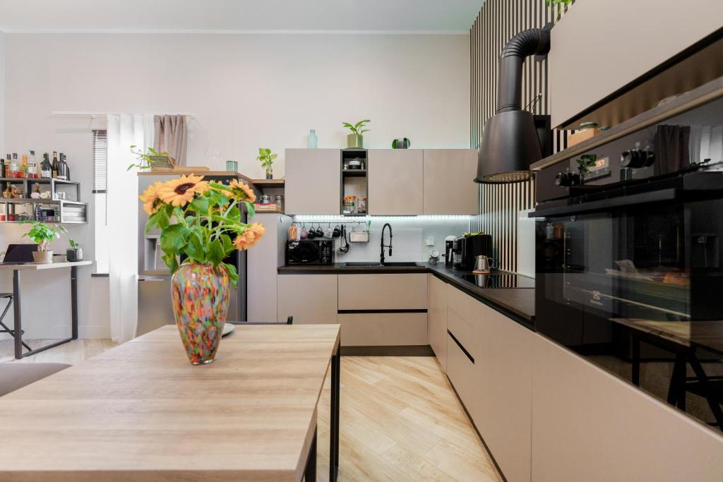 A kitchen or kitchenette at It's Room Naples