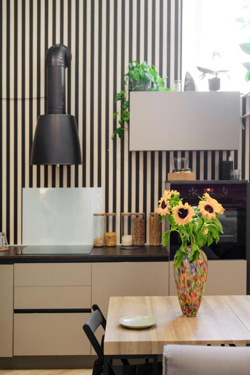 A kitchen or kitchenette at It's Room Naples
