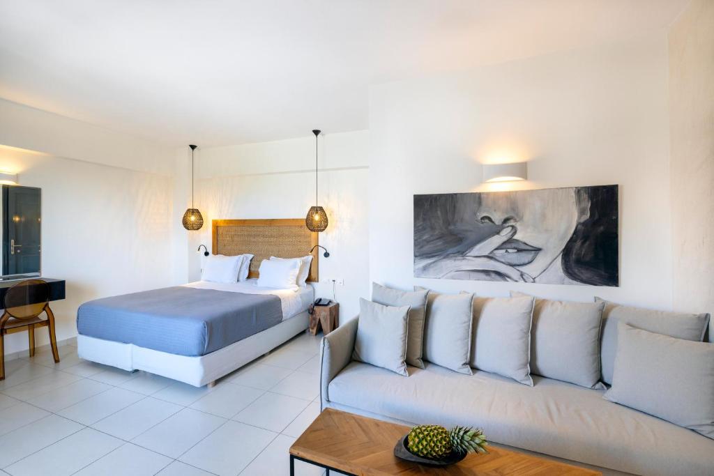 Postel nebo postele na pokoji v ubytování La Stella Suites