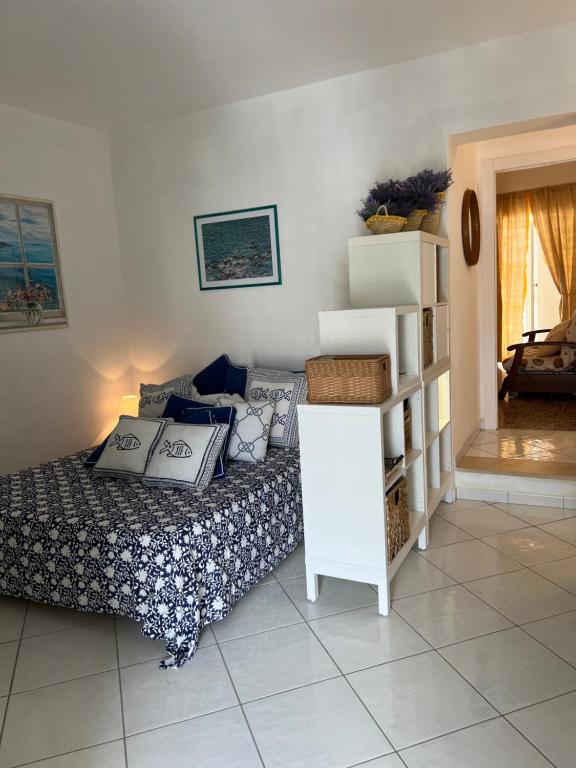 Postel nebo postele na pokoji v ubytování Mare Fuori