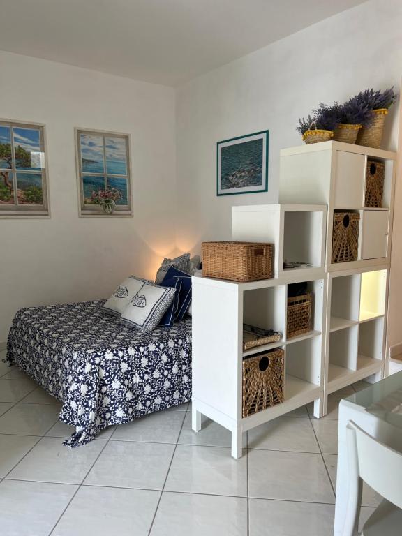 Postel nebo postele na pokoji v ubytování Mare Fuori