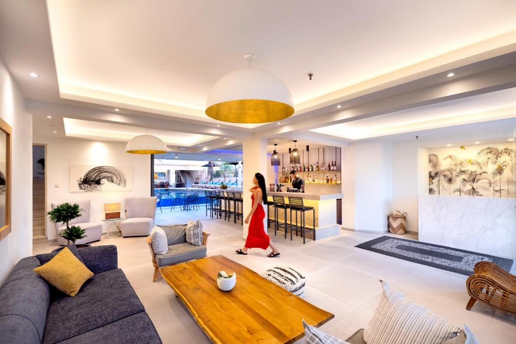 TV a/nebo společenská místnost v ubytování La Stella Suites