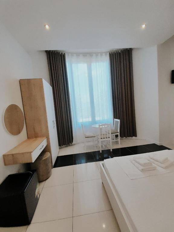 Postel nebo postele na pokoji v ubytování Hotel Restaurant Univers