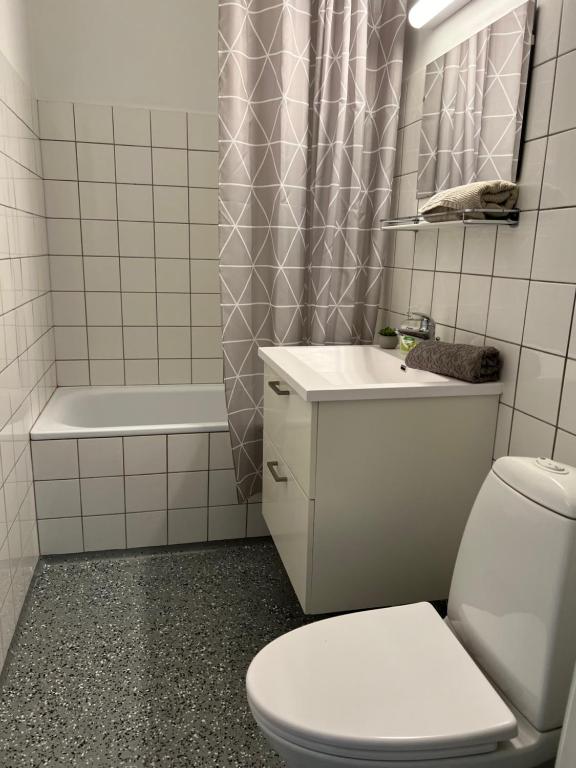 Koupelna v ubytování Stor 2 værelses lejlighed
