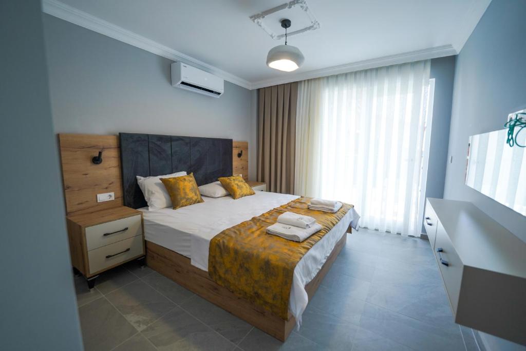 Postel nebo postele na pokoji v ubytování Han Apart Hotel Side
