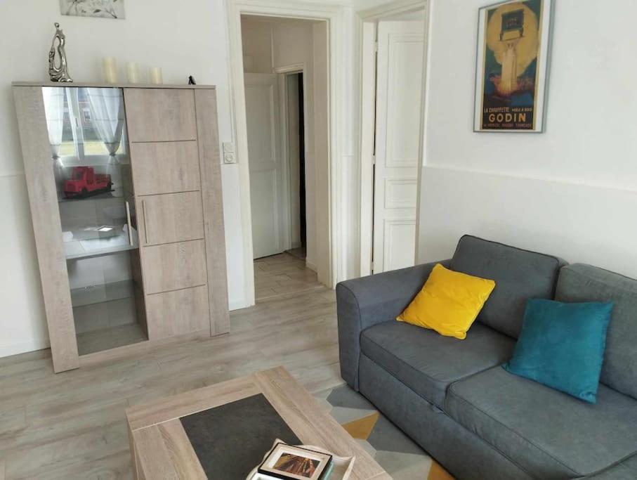 Χώρος καθιστικού στο Appartement GUISE Familistere