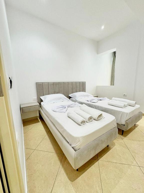 Postel nebo postele na pokoji v ubytování Hotel Balili