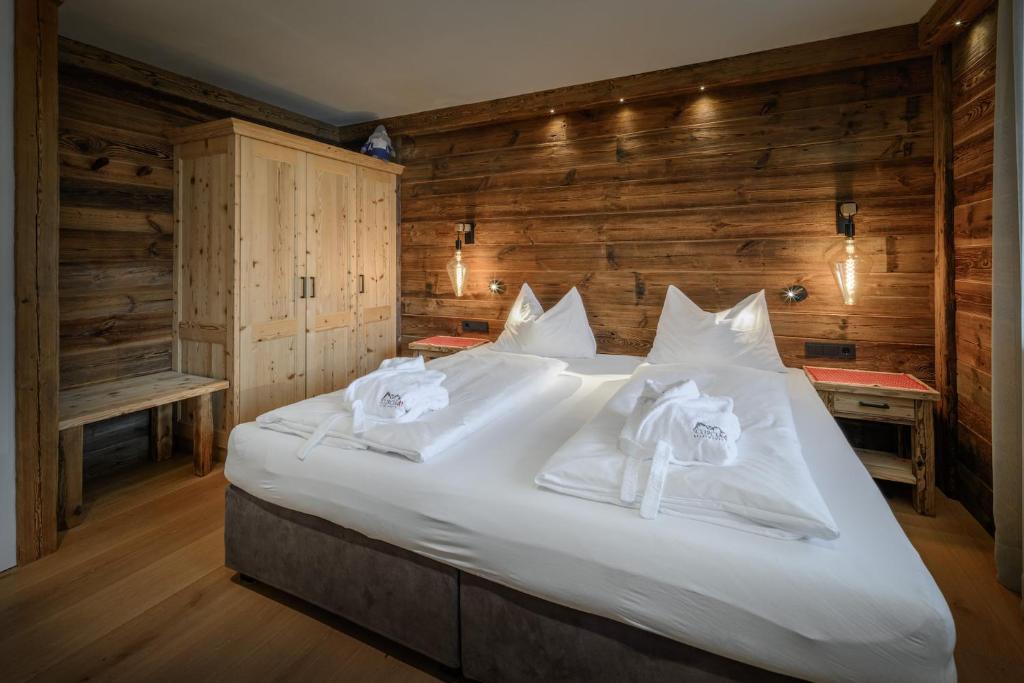 Łóżko lub łóżka w pokoju w obiekcie Apartment Scurcià 41
