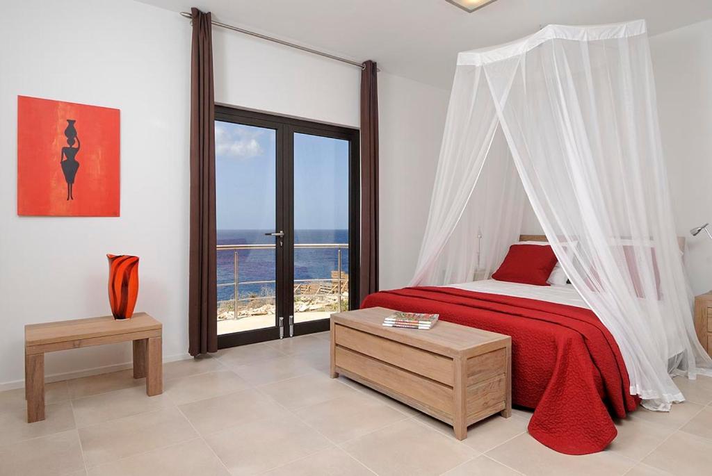 Ένα ή περισσότερα κρεβάτια σε δωμάτιο στο Villa Barranca