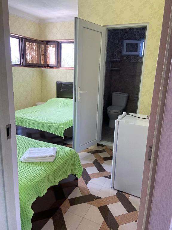 Kuchyň nebo kuchyňský kout v ubytování Hotel Kvadrati