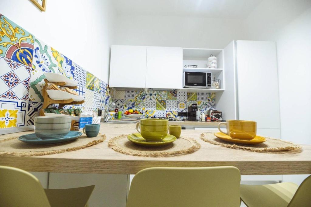 Kuchyň nebo kuchyňský kout v ubytování Casa Avignone