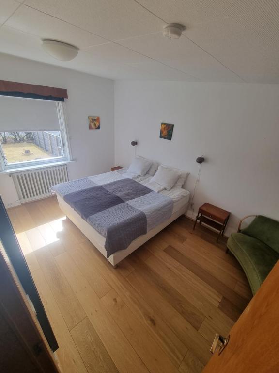 Postel nebo postele na pokoji v ubytování Spói Guesthouse