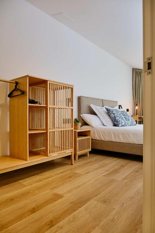 Postel nebo postele na pokoji v ubytování Hotel Molí Cardedeu