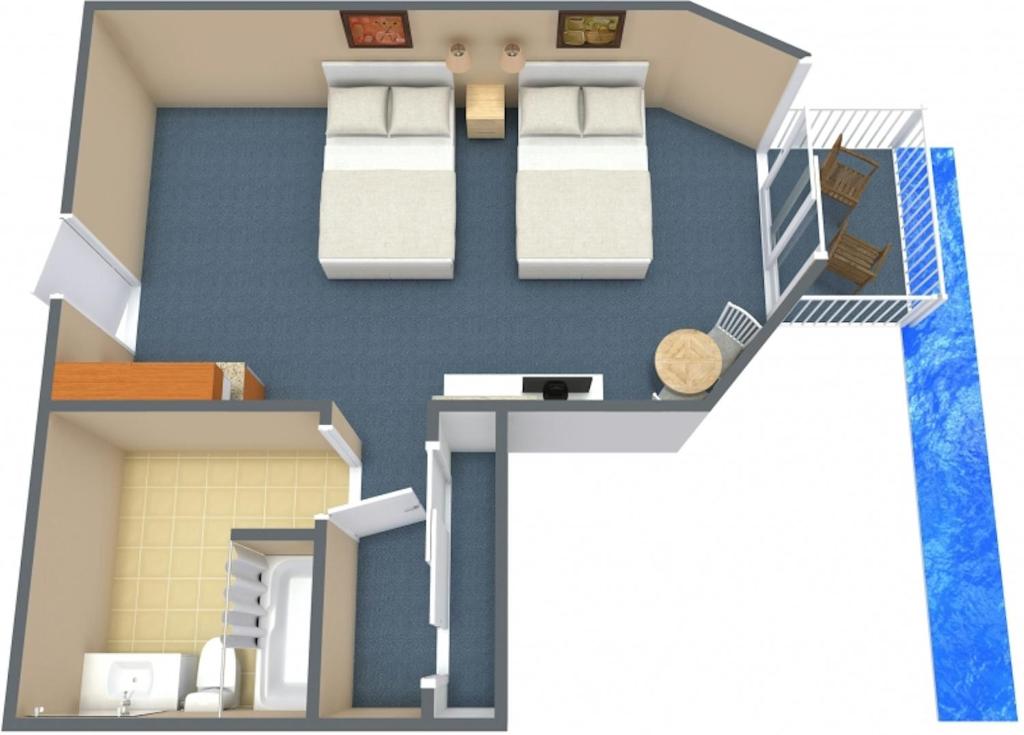 a floor plan of a room with two beds at The Strand - A Boutique Resort in Myrtle Beach