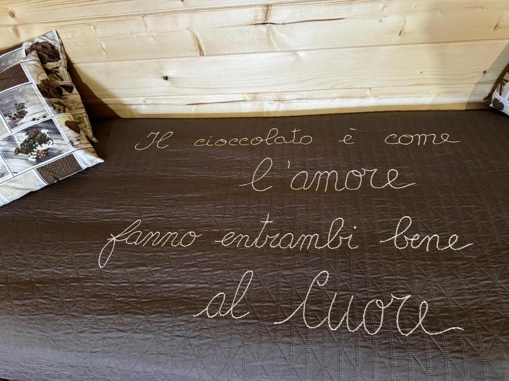 A bed or beds in a room at Choco B&B