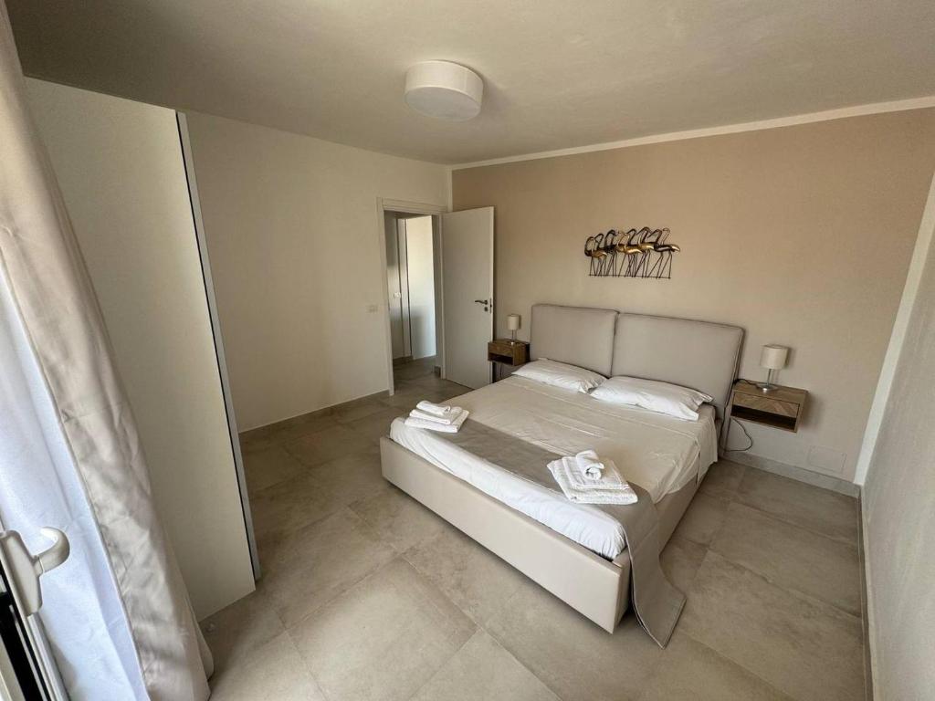 Postel nebo postele na pokoji v ubytování Panima Rooms