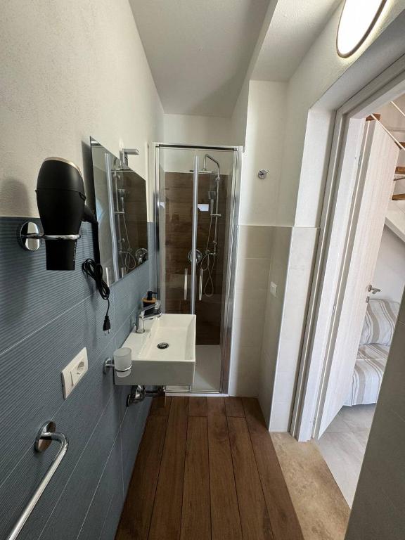 Koupelna v ubytování Panima Rooms