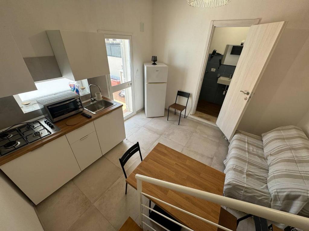 Kuchyň nebo kuchyňský kout v ubytování Panima Rooms