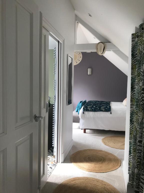 Postel nebo postele na pokoji v ubytování Manoir Saint-André,B&B de charme