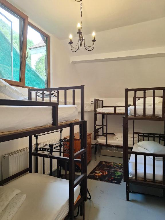 Postel nebo postele na pokoji v ubytování Downtown Hostel