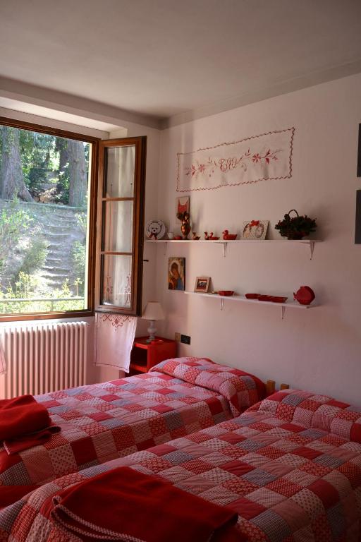 Postel nebo postele na pokoji v ubytování Marco e Cio