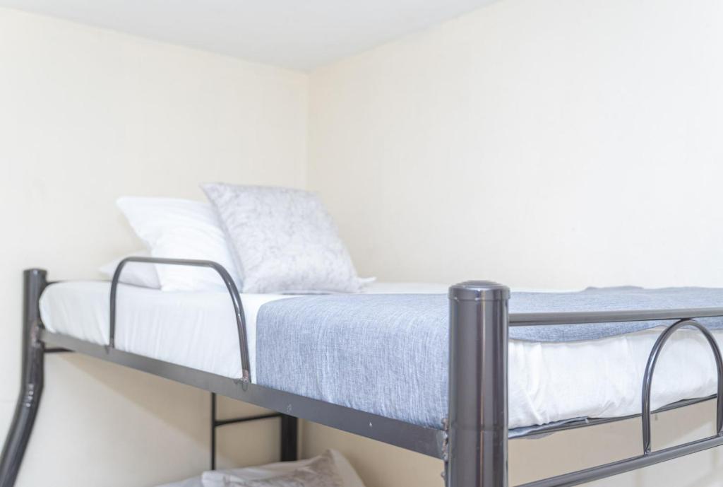 Postel nebo postele na pokoji v ubytování Hotel Conquistadores
