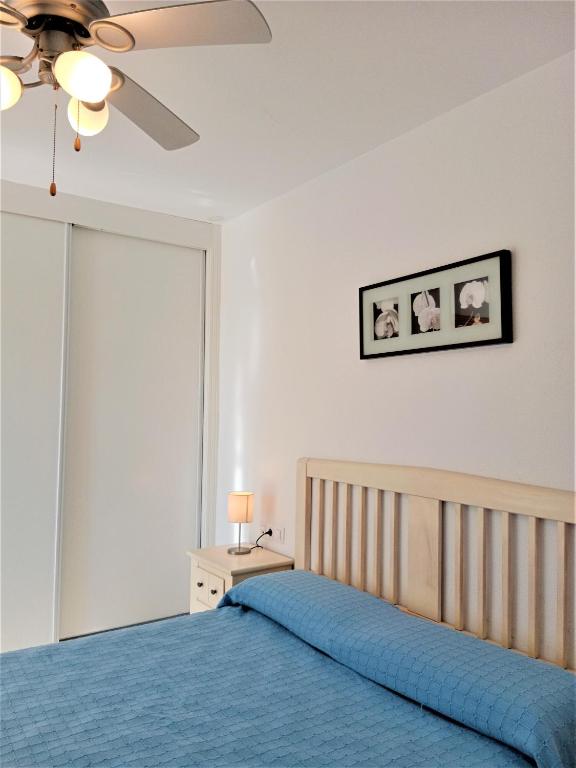 Posteľ alebo postele v izbe v ubytovaní Apartamentos Rotonda