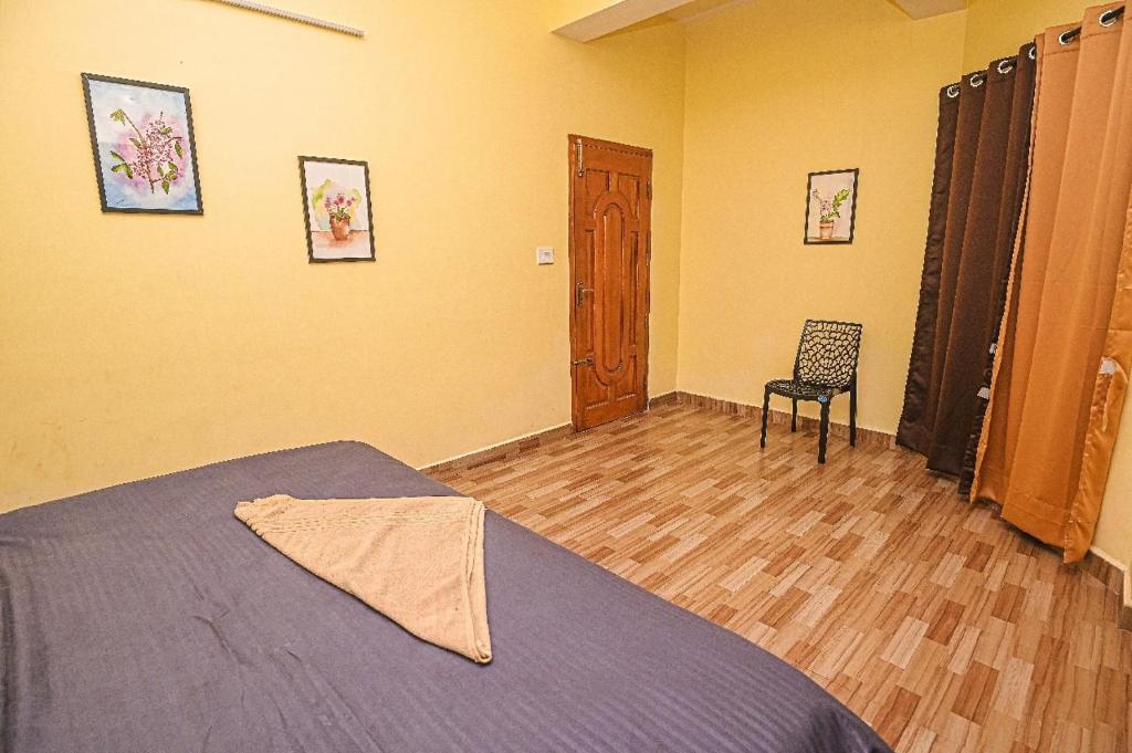 Postel nebo postele na pokoji v ubytování Jeru Homes
