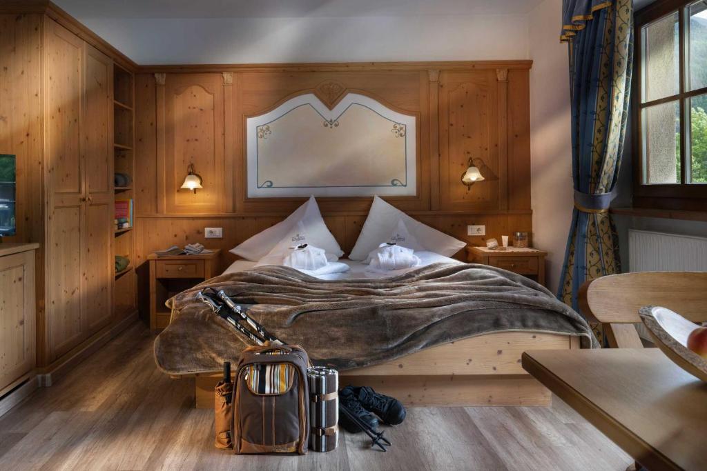 Postel nebo postele na pokoji v ubytování Hotel Alte Mühle 4 Stelle