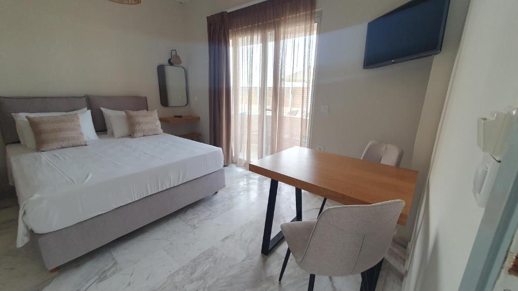 Postel nebo postele na pokoji v ubytování Oliva Beach
