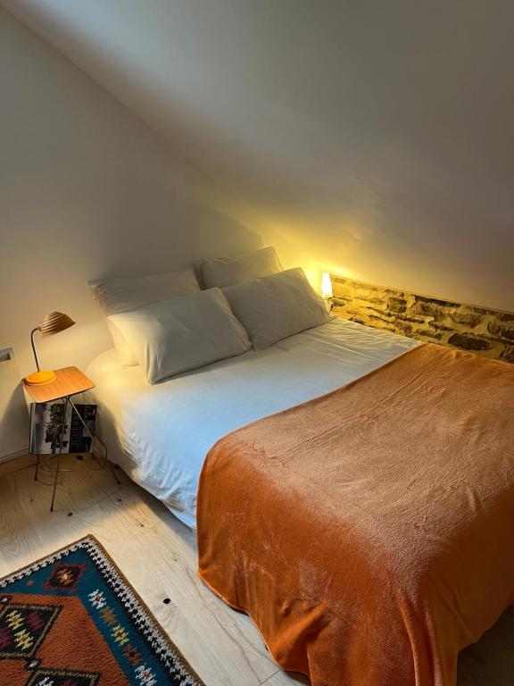 Postel nebo postele na pokoji v ubytování Gîte les vallées