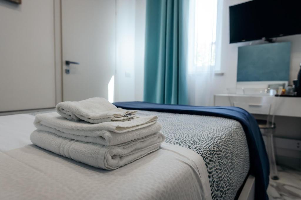 Postel nebo postele na pokoji v ubytování Capitani Guest House