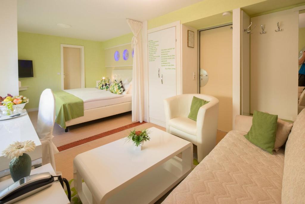 Postel nebo postele na pokoji v ubytování Central Boutique Hotel