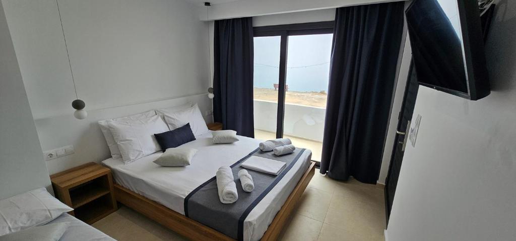 Postel nebo postele na pokoji v ubytování DG Luxury Apartments