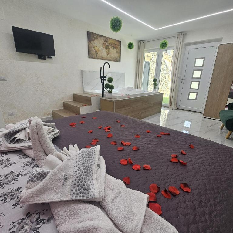 Postel nebo postele na pokoji v ubytování L'oasi del raganello